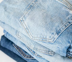 pile-of-denim-jeans Pile of old denim jeans